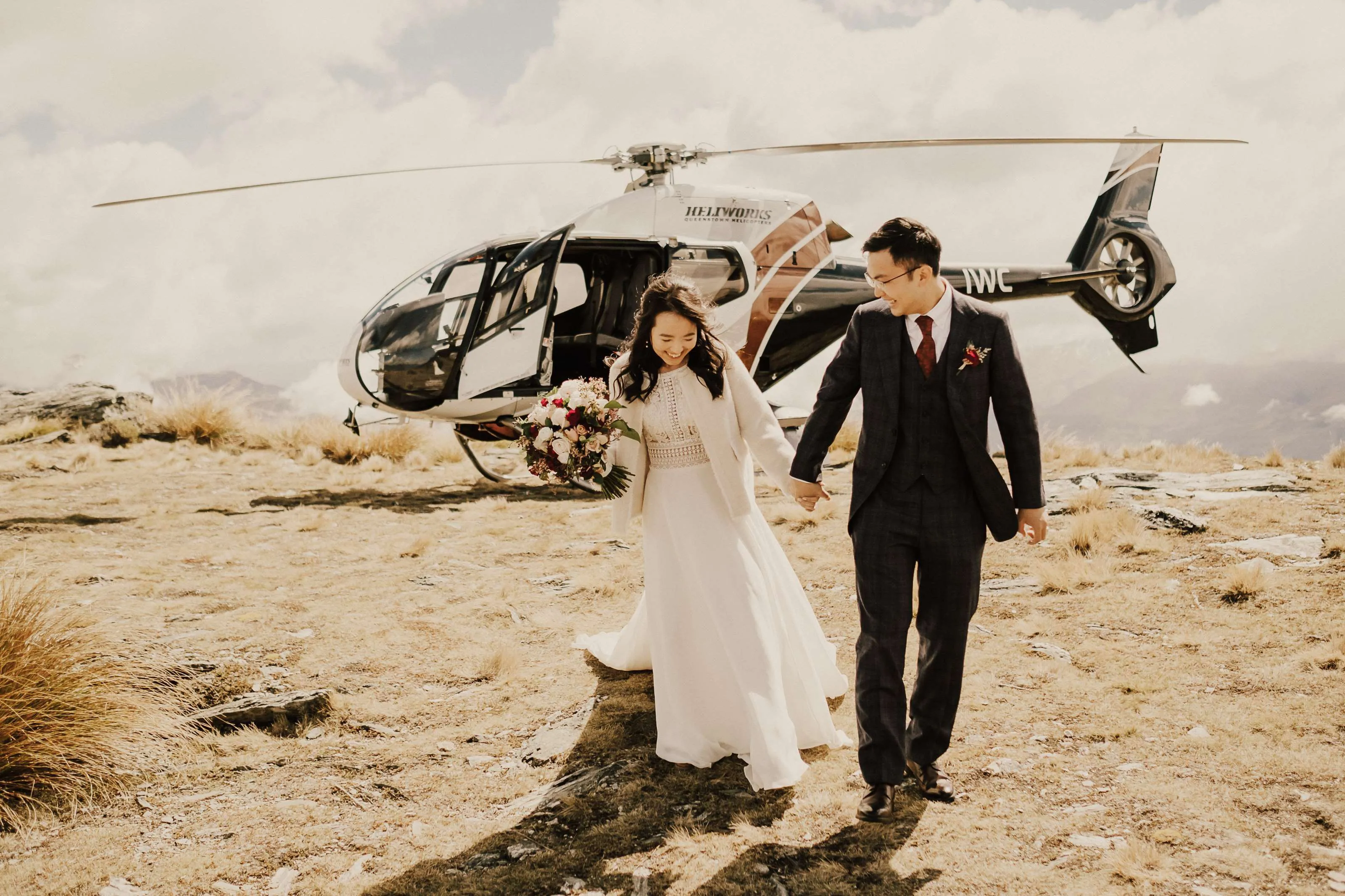 Pre-wedding photoshoot in Queenstown on a mountain with helicopter