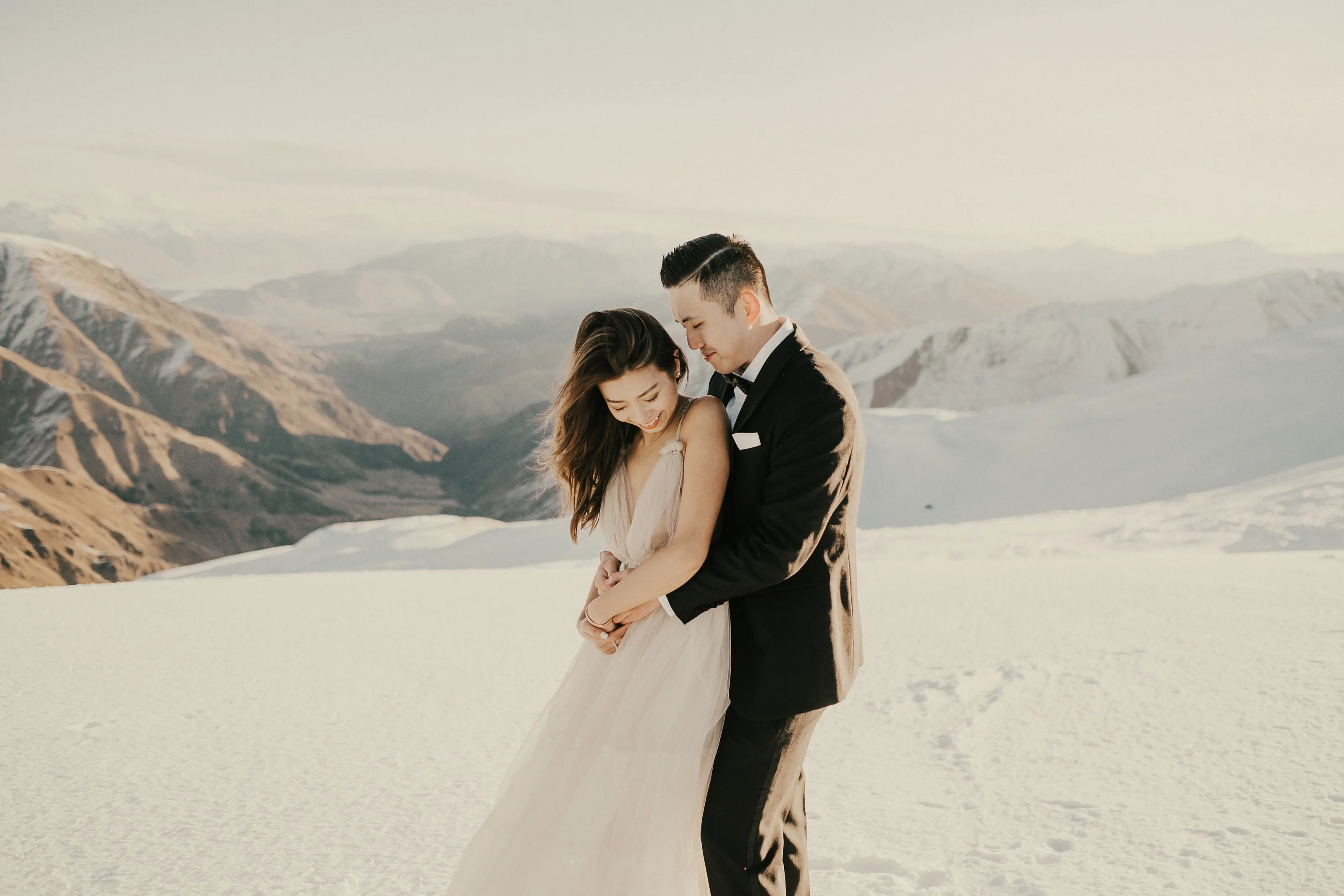 Stylish couple photos in Queenstown in the snow