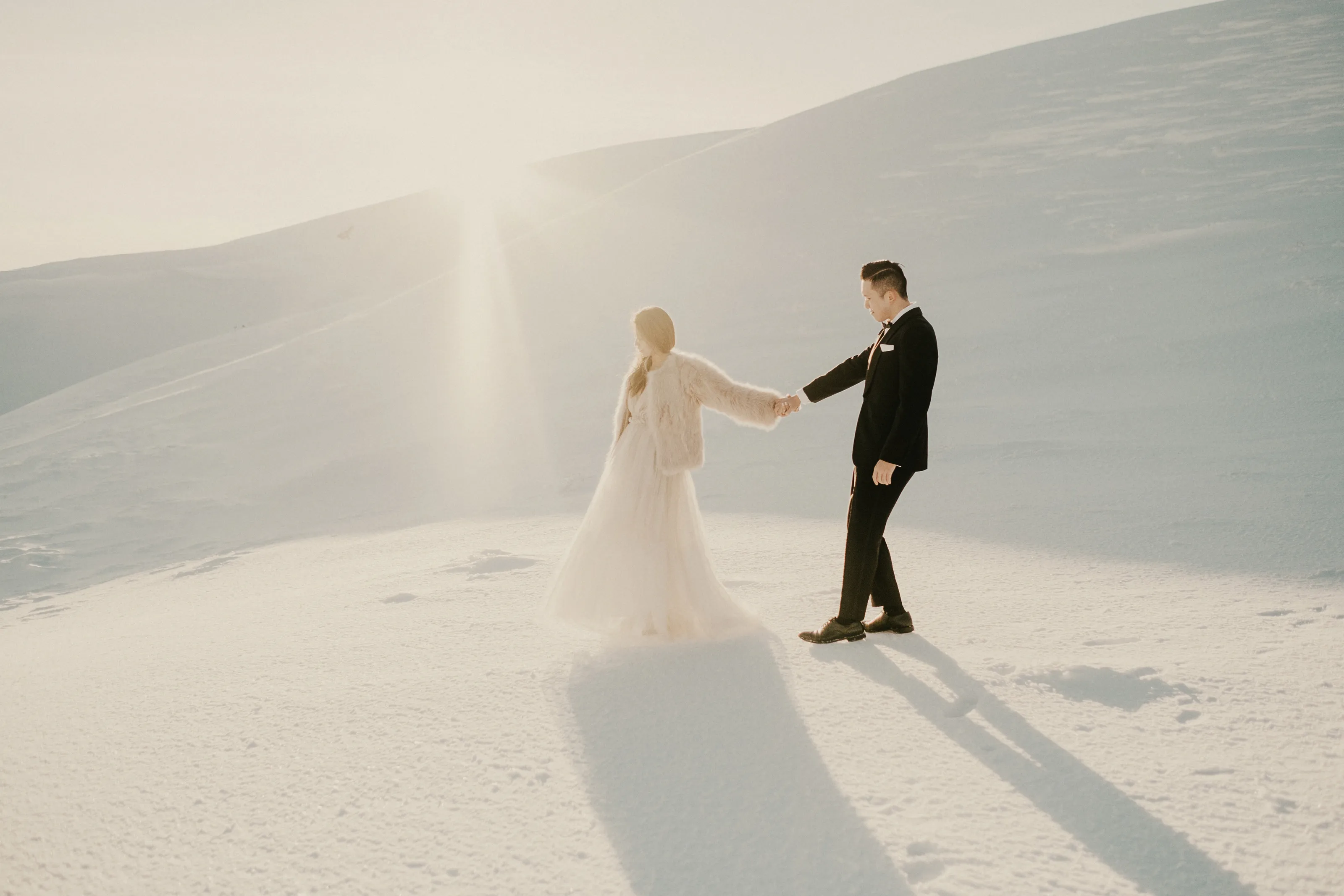 Stylish couple photos in Queenstown in the snow