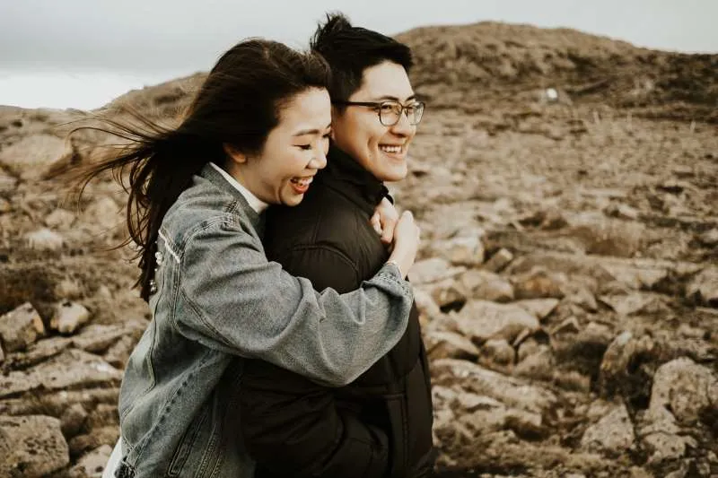 Samantha and Jarred embracing together during their photoshoot.